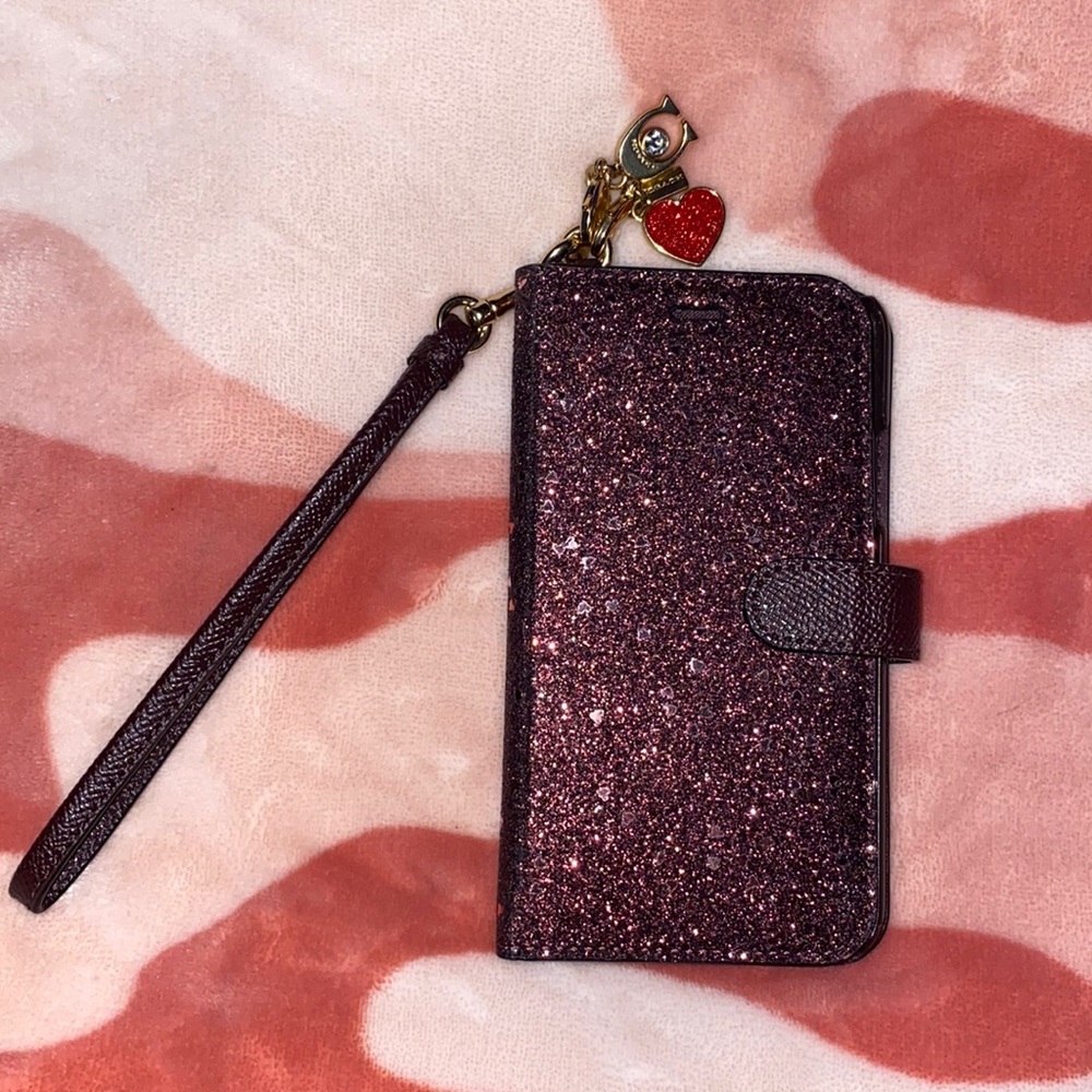 IPhone X Coach case with glitter hearts and charms